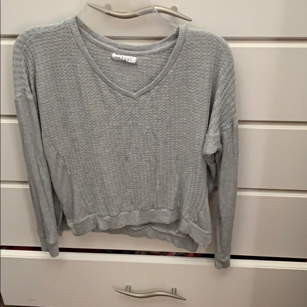 Grey loose hanging long sleev with fitted sleeves